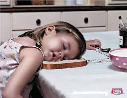 child-asleep-on-bread